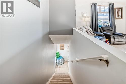 205, 27 Everridge Square Sw, Calgary, AB - Indoor Photo Showing Other Room