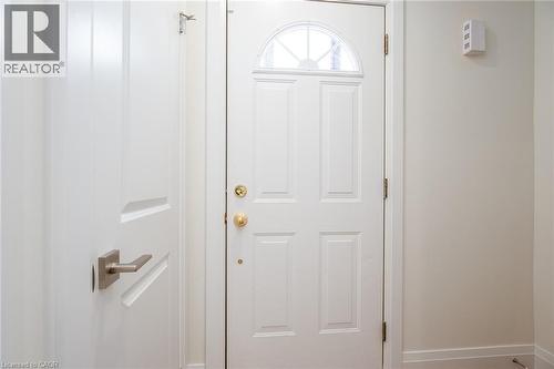 Doorway with baseboards - 27 Queenston Drive, Kitchener, ON - Indoor Photo Showing Other Room