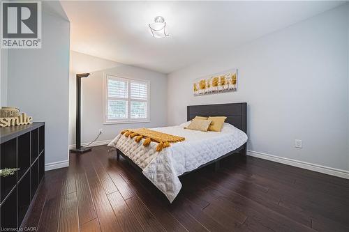 Bedroom featuring dark wood-style flooring - 25 Orchard Hill, Hamilton, ON - Indoor Photo Showing Bedroom