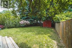 Fenced backyard with a shed - 