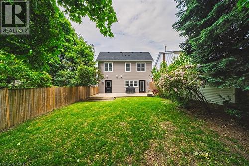 Back of property featuring a fenced backyard and a wooden deck - 25 Orchard Hill, Hamilton, ON - Outdoor