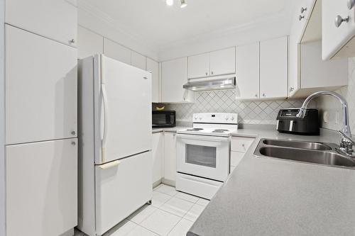 Cuisine - 1-2408 Rue Des Grisons, Laval (Vimont), QC - Indoor Photo Showing Kitchen With Double Sink