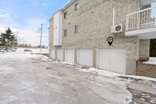 Garage - 1-2408 Rue Des Grisons, Laval (Vimont), QC - Outdoor