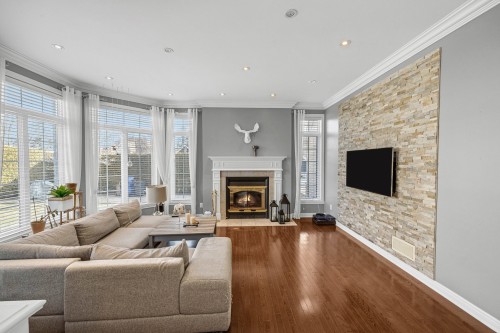 Living room - 451 Boul. De Fontainebleau, Blainville, QC - Indoor Photo Showing Living Room With Fireplace