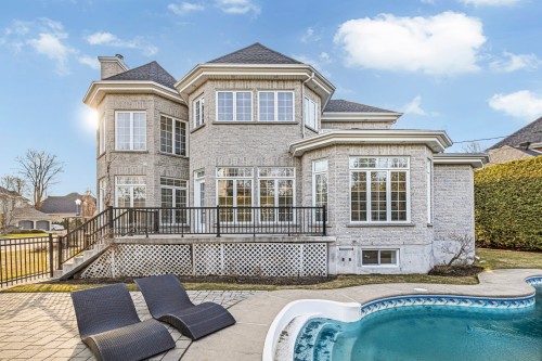 Backyard - 451 Boul. De Fontainebleau, Blainville, QC - Outdoor With In Ground Pool With Deck Patio Veranda