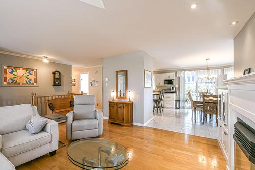 Salon - 565 Rue Des Plaines, Sainte-Adèle, QC - Indoor Photo Showing Living Room With Fireplace
