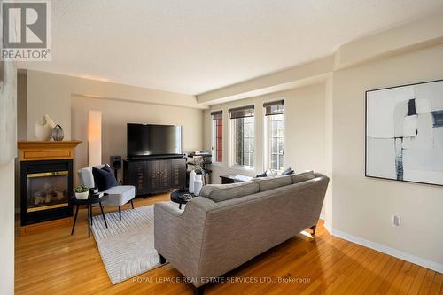 1584 Woodhenge Way, Mississauga, ON - Indoor Photo Showing Living Room With Fireplace