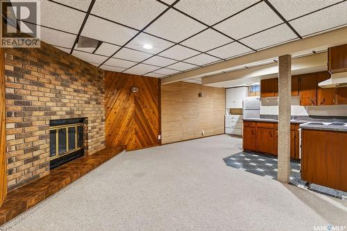 418 Tennant Way, Saskatoon, SK - Indoor Photo Showing Other Room With Fireplace