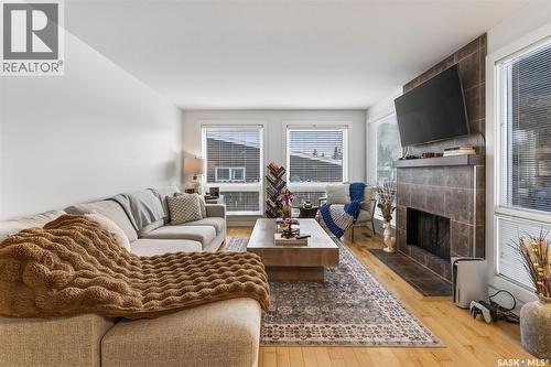 418 Tennant Way, Saskatoon, SK - Indoor Photo Showing Living Room With Fireplace