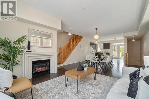 73 Cathedral High Street, Markham, ON - Indoor Photo Showing Living Room With Fireplace
