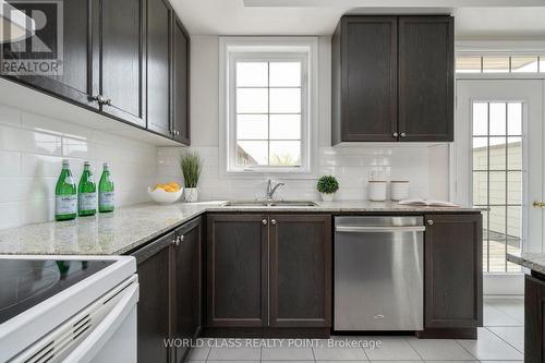 73 Cathedral High Street, Markham, ON - Indoor Photo Showing Kitchen With Double Sink