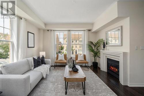 73 Cathedral High Street, Markham, ON - Indoor Photo Showing Living Room With Fireplace