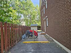 Bike Rack, siide entrance & recycling shed - 