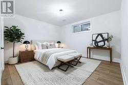 Virtually Staged Basement Bedroom - 