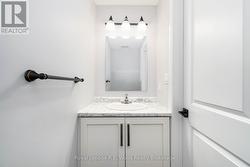 2 piece bathroom right off the entrance - 