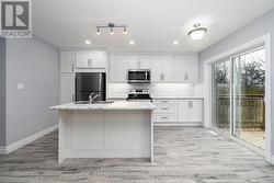 Sliding doors to the backyard just off the kitchen - 