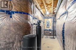 Water softener, electrical panel, and sump - 