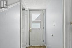 Side entrance leads to basement stairs - 