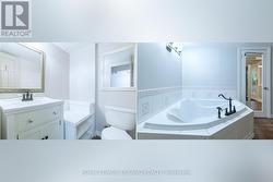 Bathroom + tub in lower level master (bedroom 3) - 