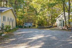 Tons of parking at house, garage, & shed - 