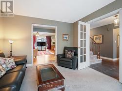 Bright living room leading to family rom - 