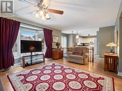 Large family room overlooking the backyard - 