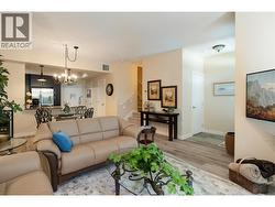 Living room view through dining area and into kitchen - 