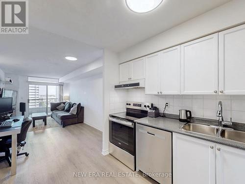 923 - 3888 Duke Of York Boulevard, Mississauga, ON - Indoor Photo Showing Kitchen With Double Sink