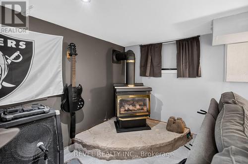 27 Mayflower Avenue, Hamilton, ON - Indoor With Fireplace