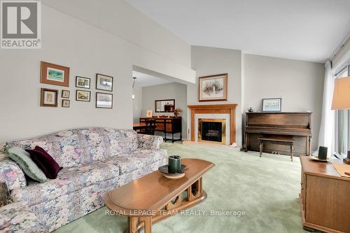 1137 Ambleside Drive, Ottawa, ON - Indoor Photo Showing Living Room With Fireplace