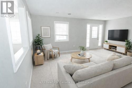 Virtually staged - 72 - 3320 Meadowgate Boulevard, London South (South U), ON - Indoor Photo Showing Living Room
