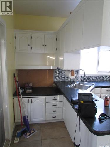 2678 Robinson Street, Regina, SK - Indoor Photo Showing Kitchen With Double Sink