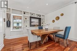 Dining Room Features Stunning Custom Cabinetry - 
