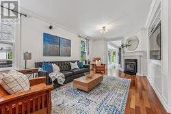 Living Room Highlighted by a Woodburning Fireplace - 