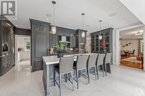 Chef's Kitchen with Illuminated Display Cabinetry - 335 Lakeshore Road W, Oakville, ON - Indoor