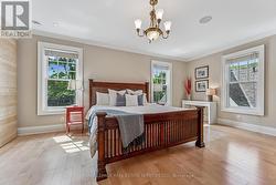 The Primary Bedroom Features a Walk-In Closet - 