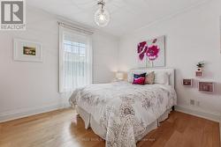 Second Bedroom with Hardwood Flooring - 