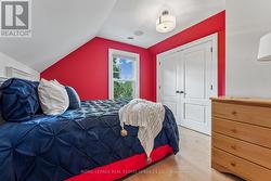 Fifth Bedroom with Hardwood Flooring - 