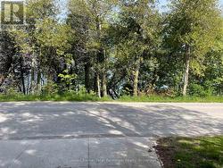 Driveway of home, stairs to the beach - 