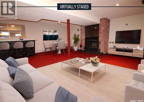 413 Hayes Drive, Swift Current, SK - Indoor Photo Showing Living Room With Fireplace