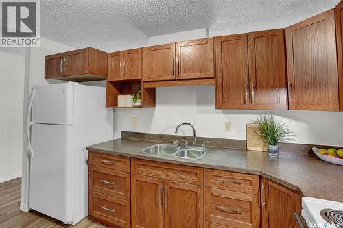 402 2125 Osler Street, Regina, SK - Indoor Photo Showing Kitchen With Double Sink