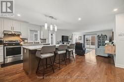 Gourmet kitchen w/high end appl's, stone & more - 