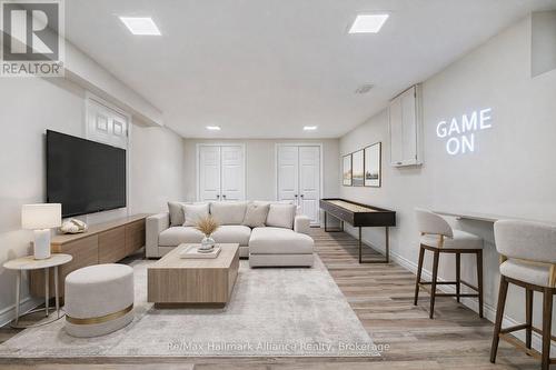 Basement recreation room-virtually staged - 1188 Carey Road, Oakville (Mo Morrison), ON - Indoor