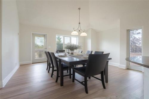 virtually staged - 2 Parkside Place, Steinbach, MB - Indoor Photo Showing Dining Room