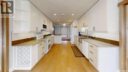 207 4Th Avenue W, Coleville, SK - Indoor Photo Showing Kitchen With Double Sink
