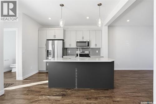966 Mcfaull Manor, Saskatoon, SK - Indoor Photo Showing Kitchen With Upgraded Kitchen