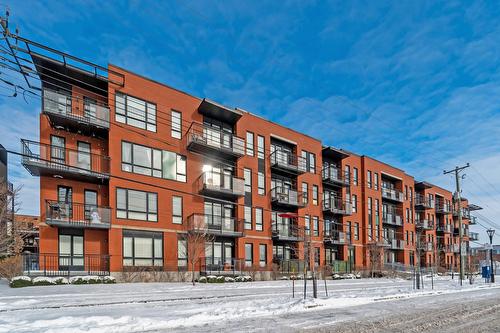 Façade - 405-2335 Av. Bennett, Montréal (Mercier/Hochelaga-Maisonneuve), QC - Outdoor With Balcony With Facade