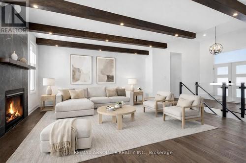 Virtually staged living room - 989 William Mooney Road, Ottawa, ON - Indoor Photo Showing Living Room With Fireplace