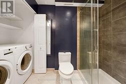 Second Floor - Unit 1 - Bathroom/Laundry Room - 