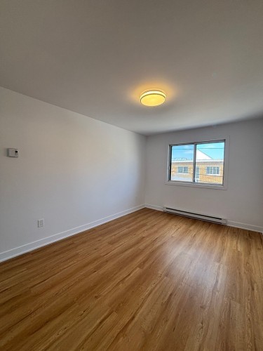 Salon - 4-1976 Rue L.-O.-David, Montréal (Villeray/Saint-Michel/Parc-Extension), QC - Indoor Photo Showing Other Room